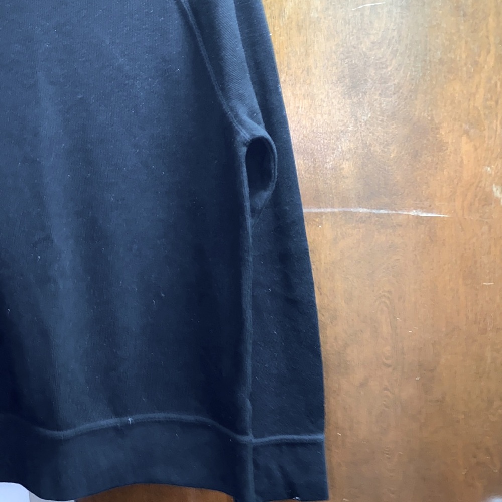 One men’s sweater